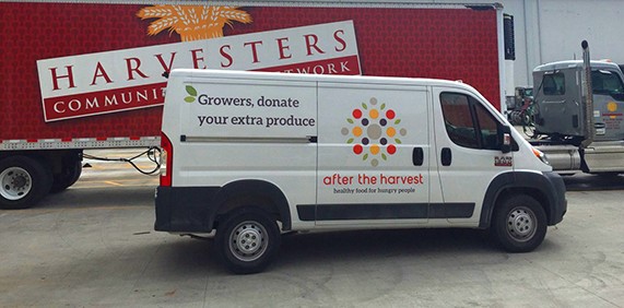 Harvester's Van picking up after the Harvest gleaning produce.